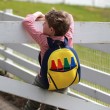 Child with Color My World Backpack