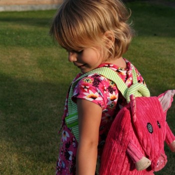 Toddler with Jambonos the Pig Backpack