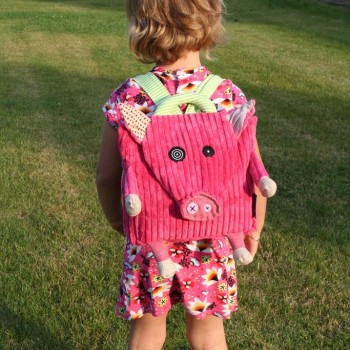 Toddler with Jambonos the Pig Backpack