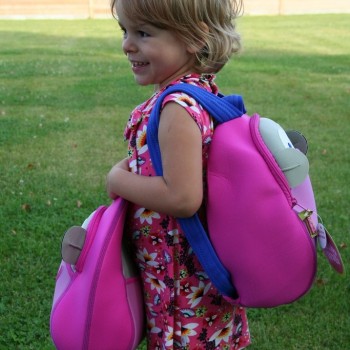 Child with Pink Monkey Backpack