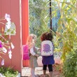 Children with Penelope Backpacks